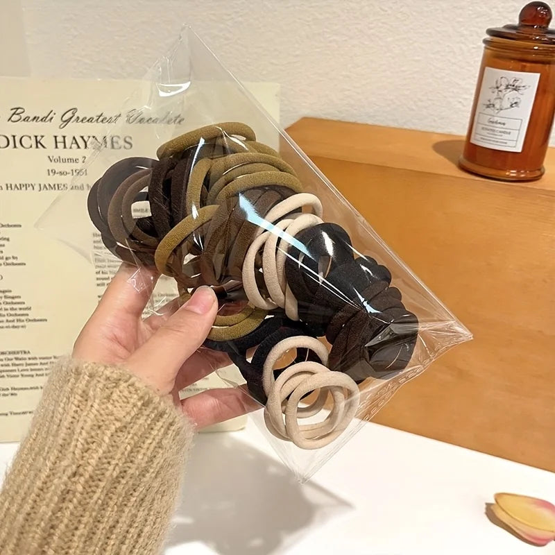 Attaches de cheveux élastiques sans couture style Boho, 50/100 pièces, épais, confortables et durables, porte-queue de cheval pour femmes, accessoires pour cheveux de couleur unie